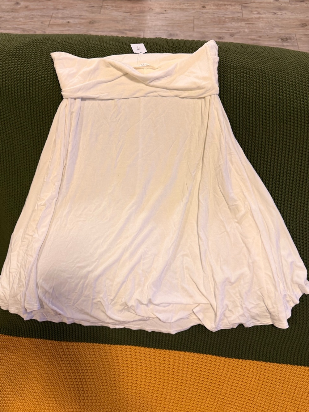 White skirt with folded waistline. Small: New with tags